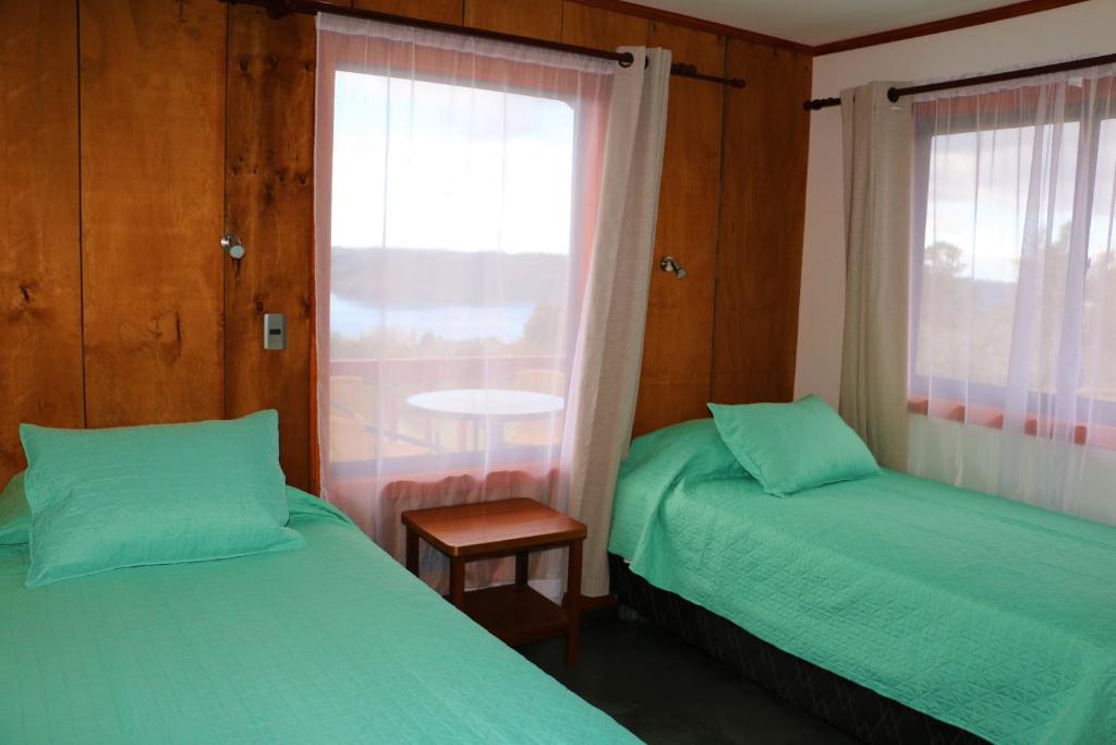 Ein Bett oder Betten in einem Zimmer der Unterkunft Terrazas de Nercon