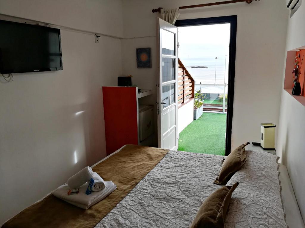 Postel nebo postele na pokoji v ubytování Hostería Miramar