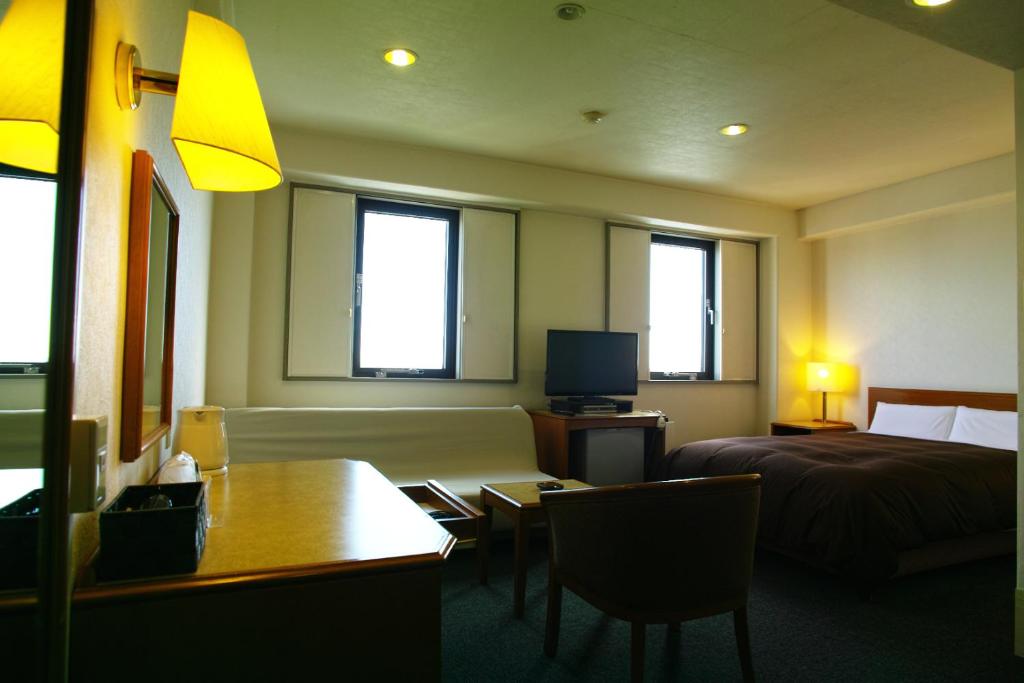 TV a/nebo společenská místnost v ubytování Tourist Hotel Hitachi