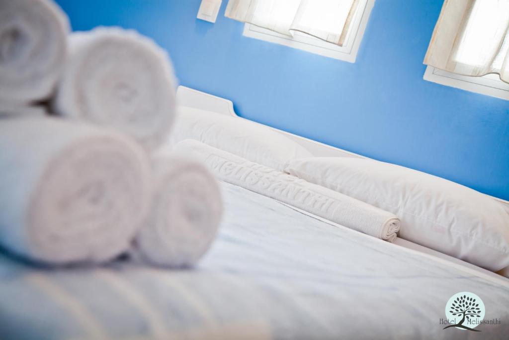 Postel nebo postele na pokoji v ubytování Hotel Melissanthi