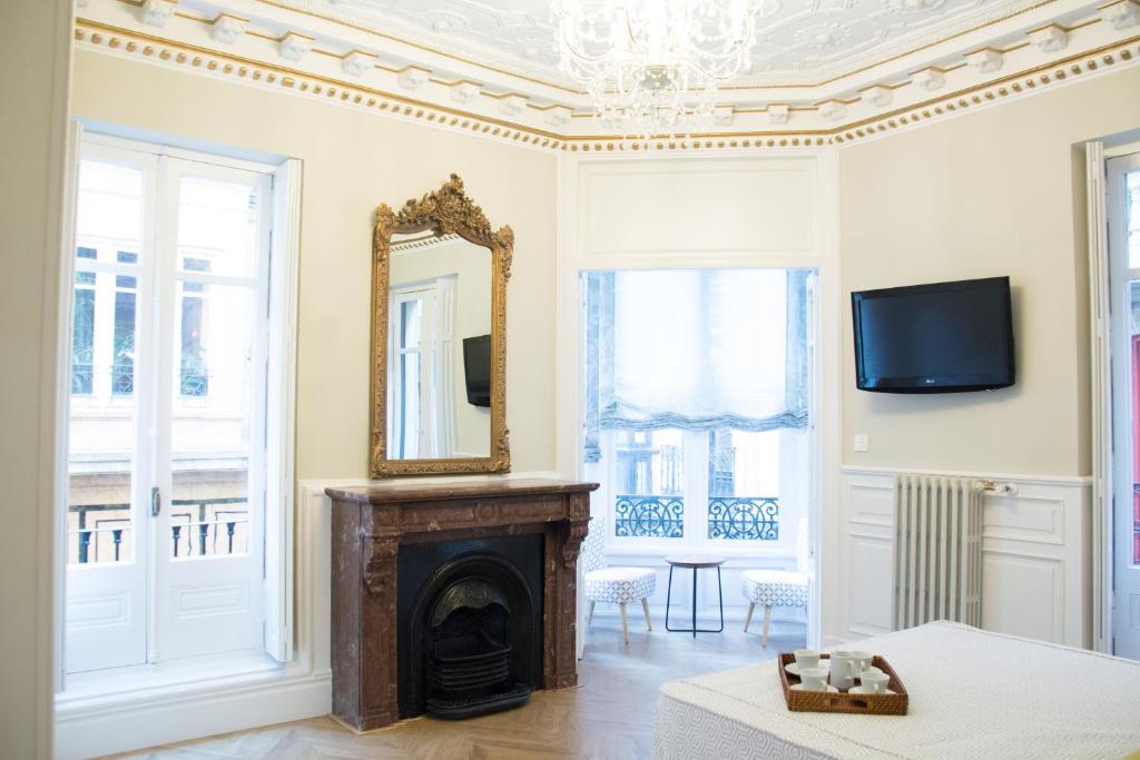 Телевизор и/или развлекательный центр в Apartamento Alaia
