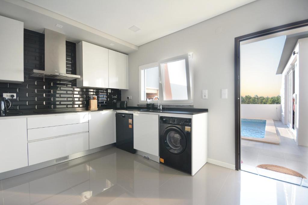 Kuchyň nebo kuchyňský kout v ubytování Paradise Terrace House