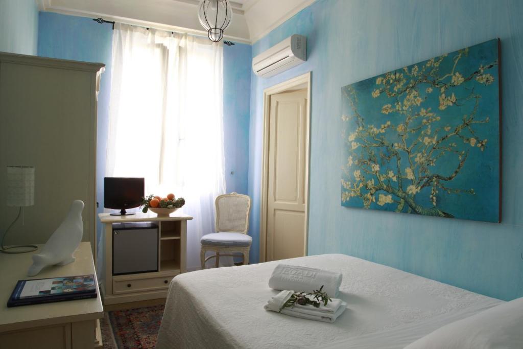 Postel nebo postele na pokoji v ubytování Albergo Egadi