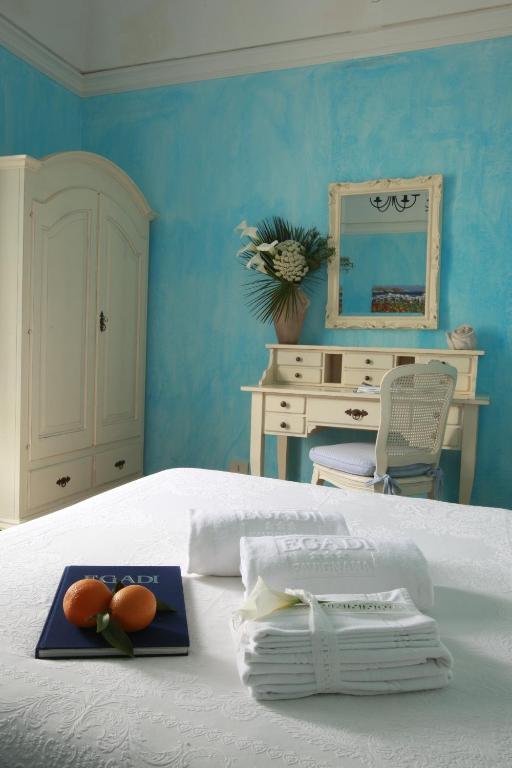 Postel nebo postele na pokoji v ubytování Albergo Egadi
