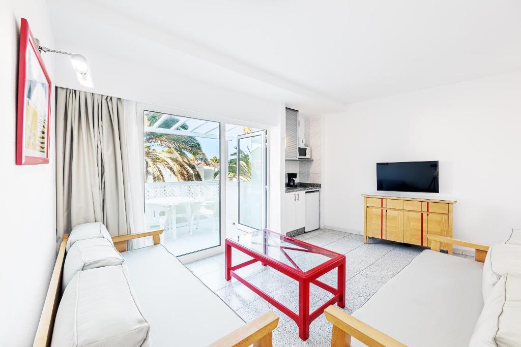 TV a/nebo společenská místnost v ubytování Apartamentos LIVVO Koala Garden