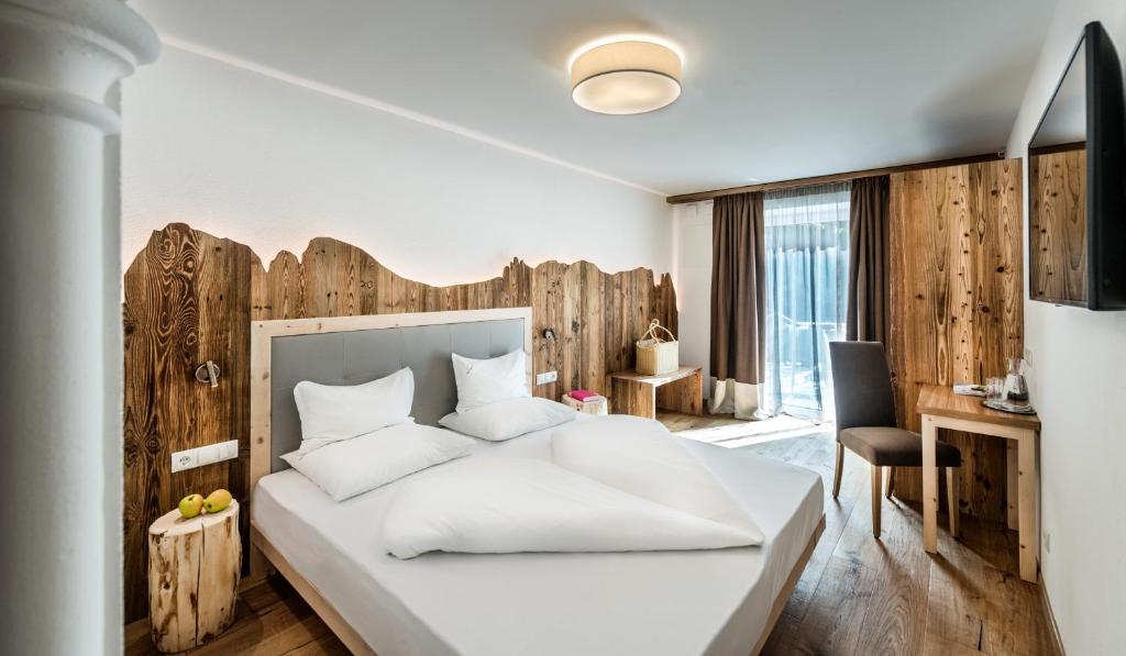 Łóżko lub łóżka w pokoju w obiekcie Hotel Schmung