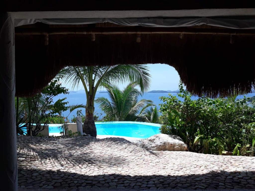 Bazén v ubytování AL FARO Cosmio Hotel Palawan nebo v jeho okolí