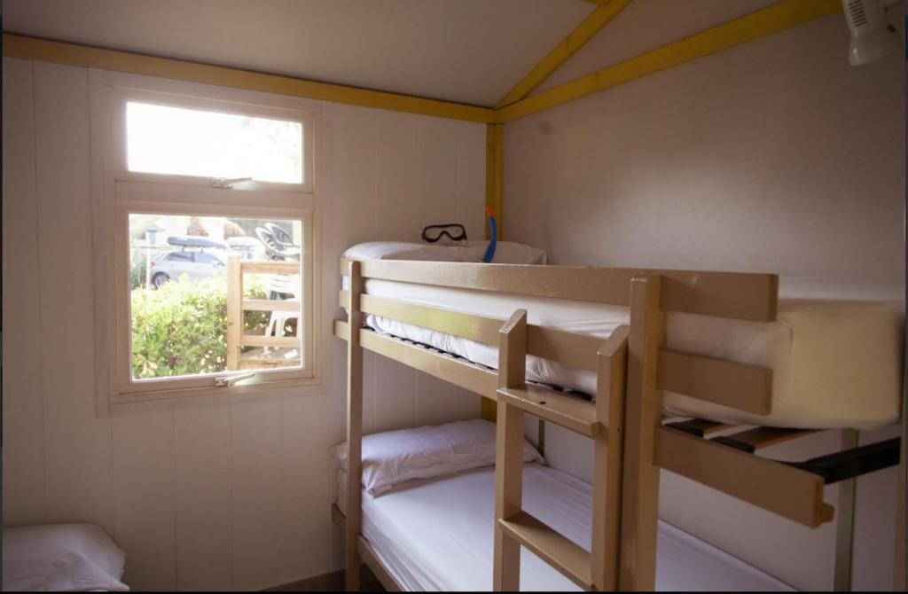 Postel nebo postele na pokoji v ubytování Camping Sènia Tucan