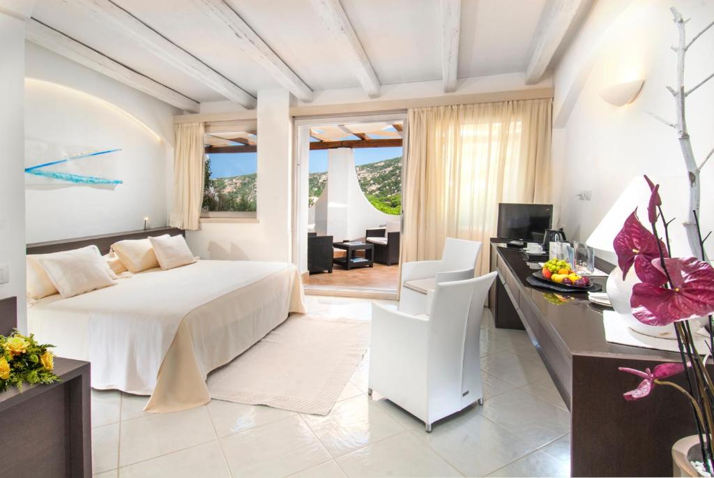 Postel nebo postele na pokoji v ubytování Hotel Punta Est