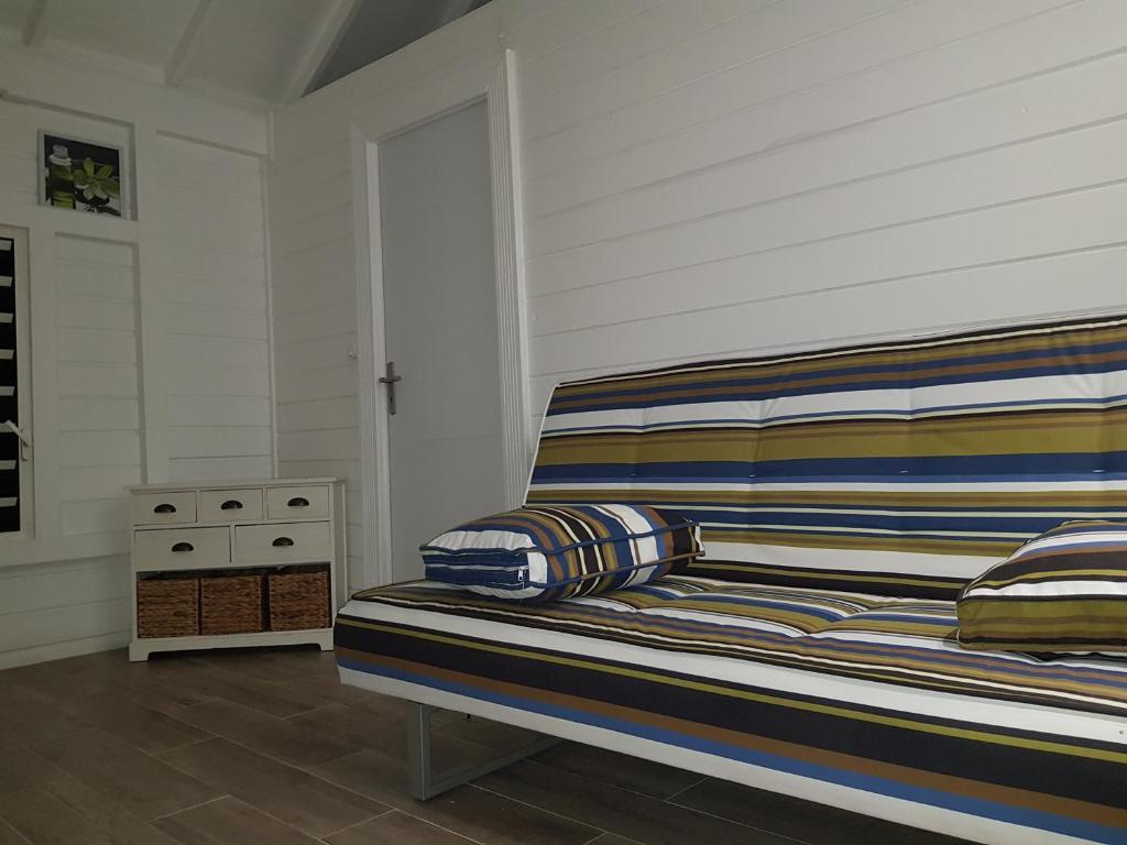Postel nebo postele na pokoji v ubytování Bungalow Akwarel