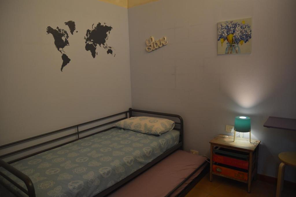 Postel nebo postele na pokoji v ubytování Lucernaio Rooms