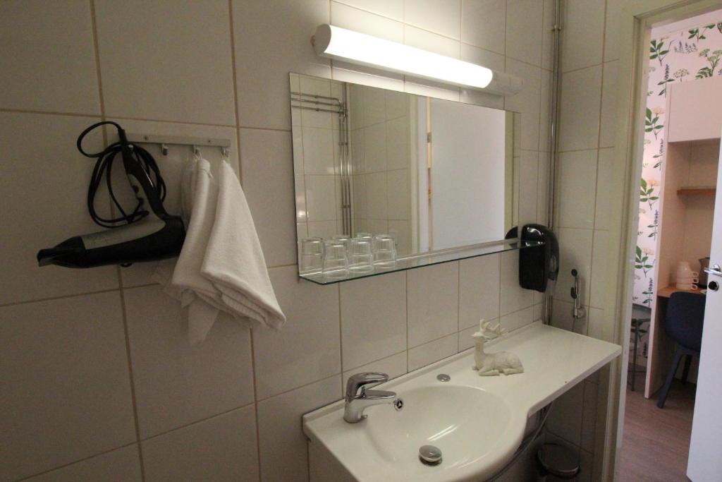 Koupelna v ubytování Hotel Aakenus