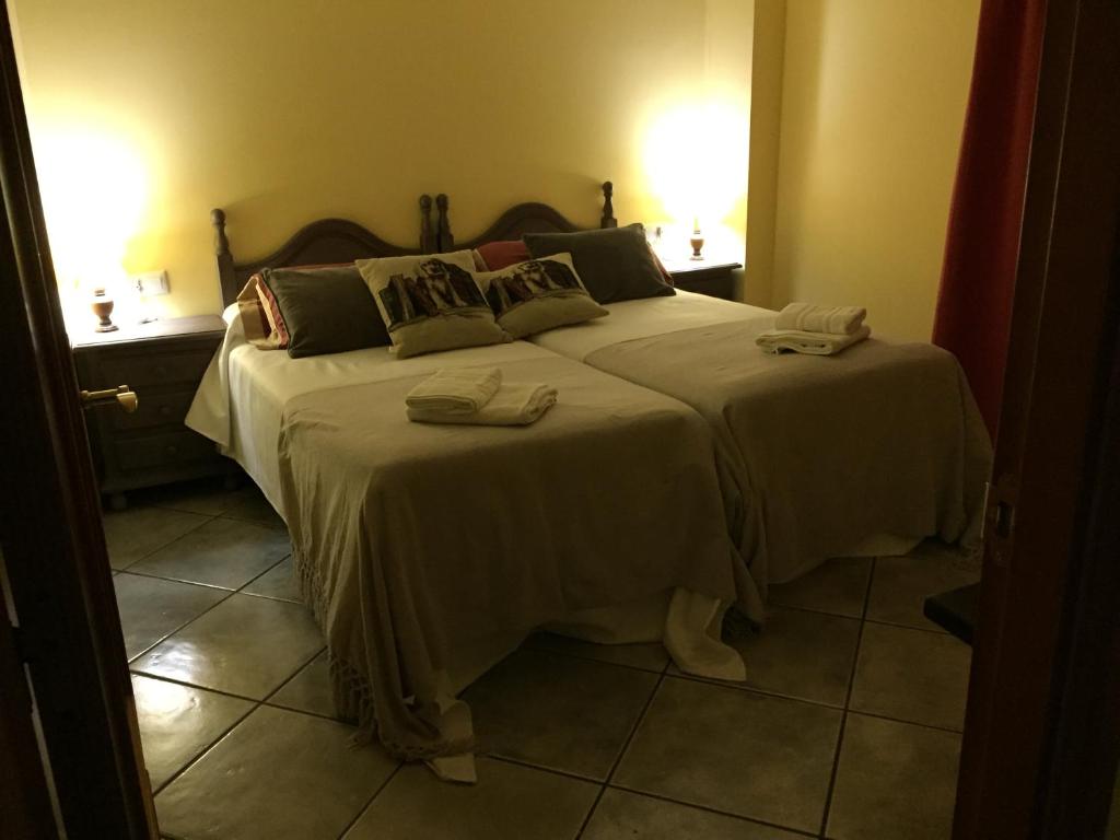 Postel nebo postele na pokoji v ubytování La Fusteria del Casat