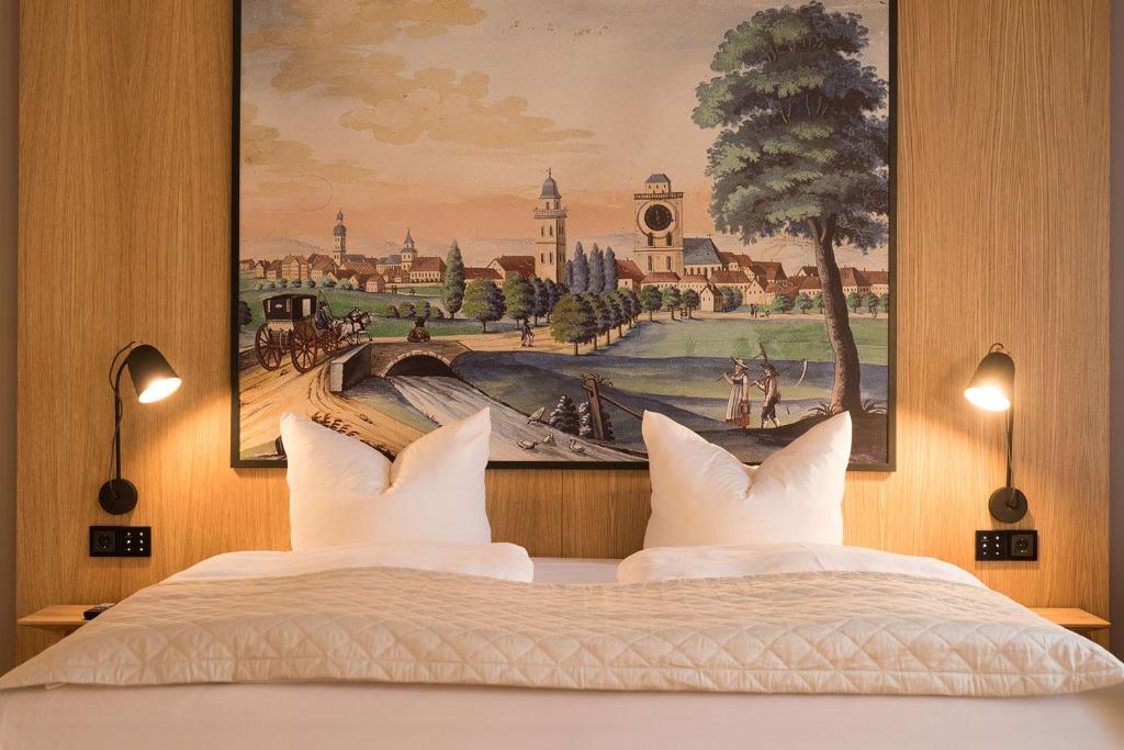 Postel nebo postele na pokoji v ubytování Hotel Bayerischer Hof