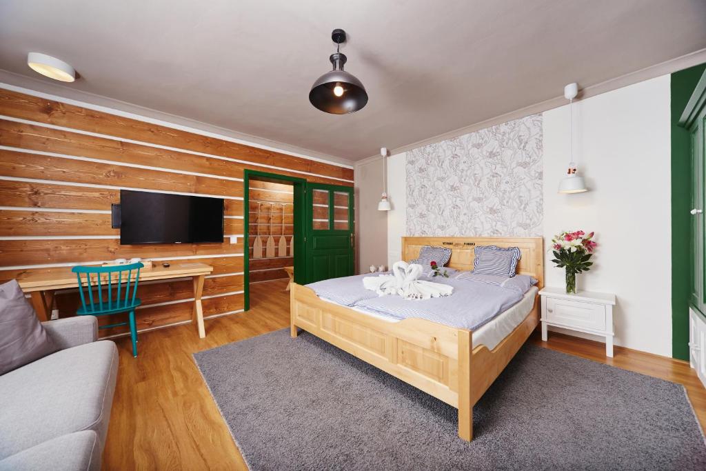 Postel nebo postele na pokoji v ubytování Vltavská pohádka