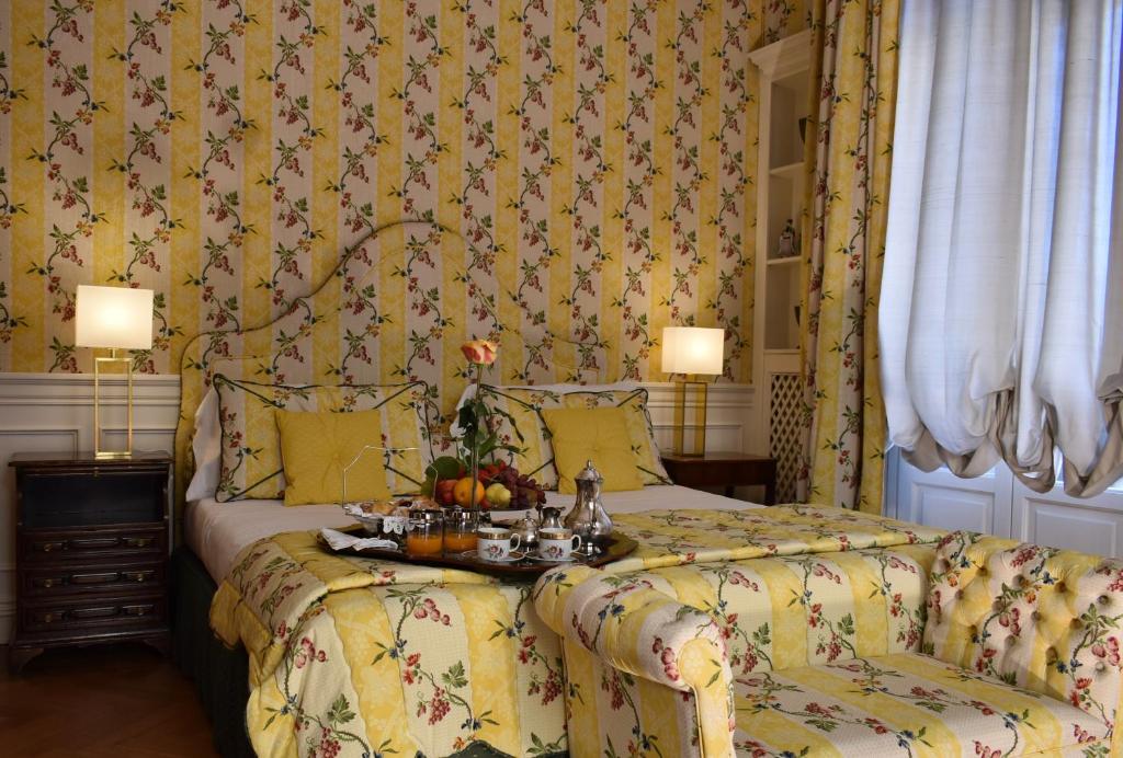 Postel nebo postele na pokoji v ubytování Palazzina Mori - Luxury B&B