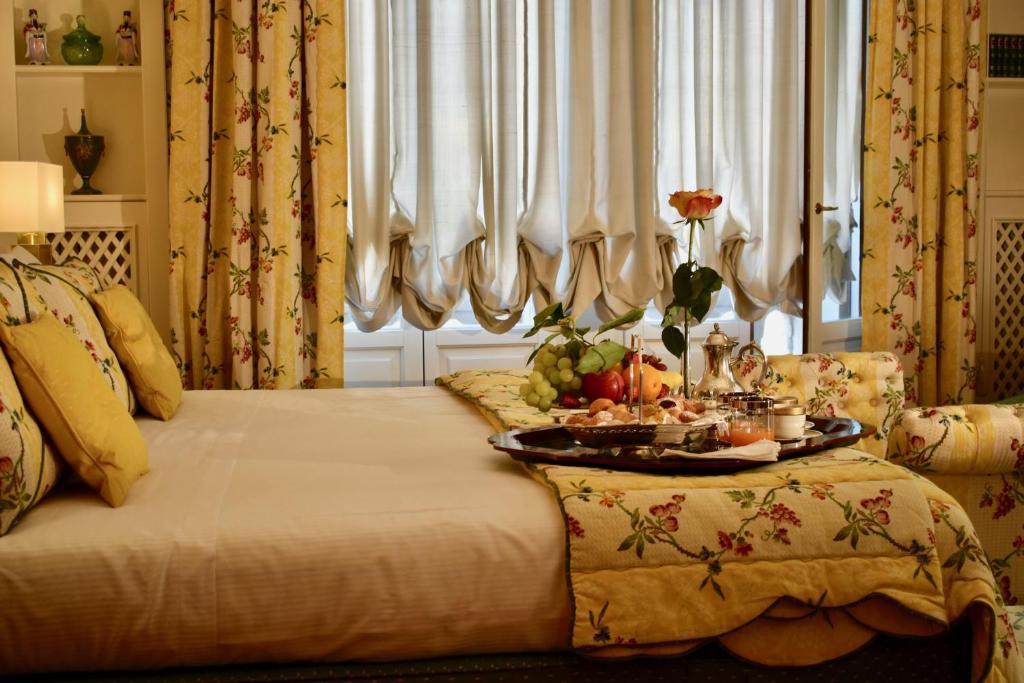 Postel nebo postele na pokoji v ubytování Palazzina Mori - Luxury B&B
