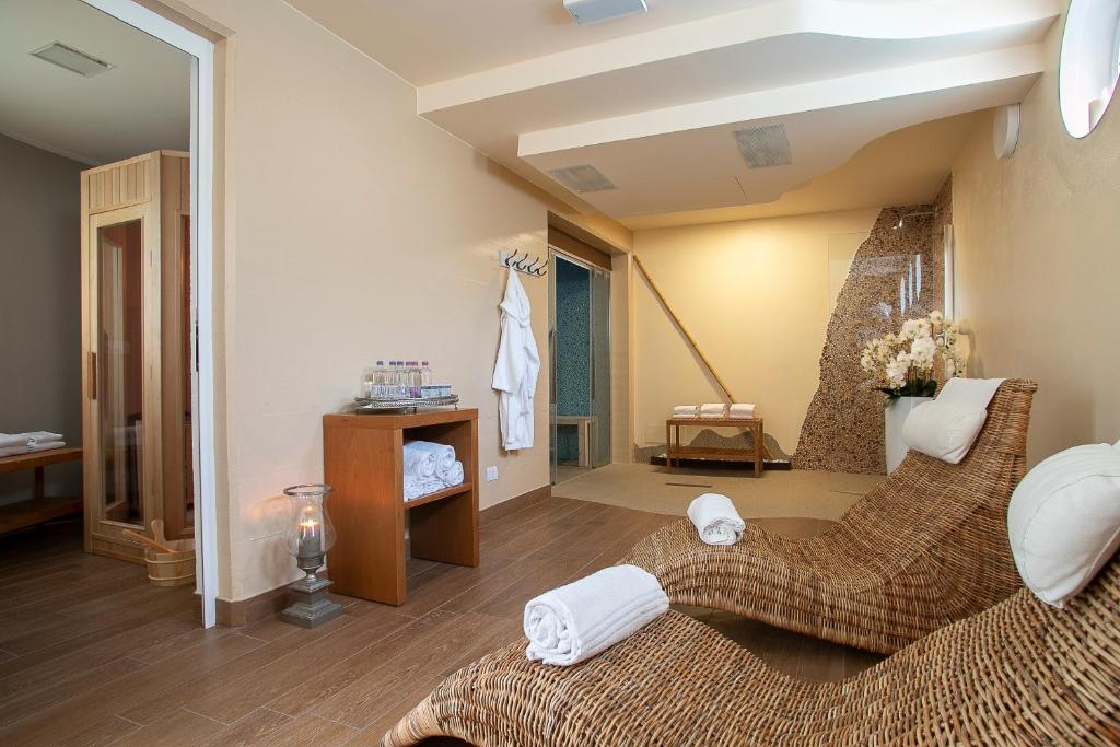 Posteľ alebo postele v izbe v ubytovaní Park Hotel Ermitage Resort & Spa