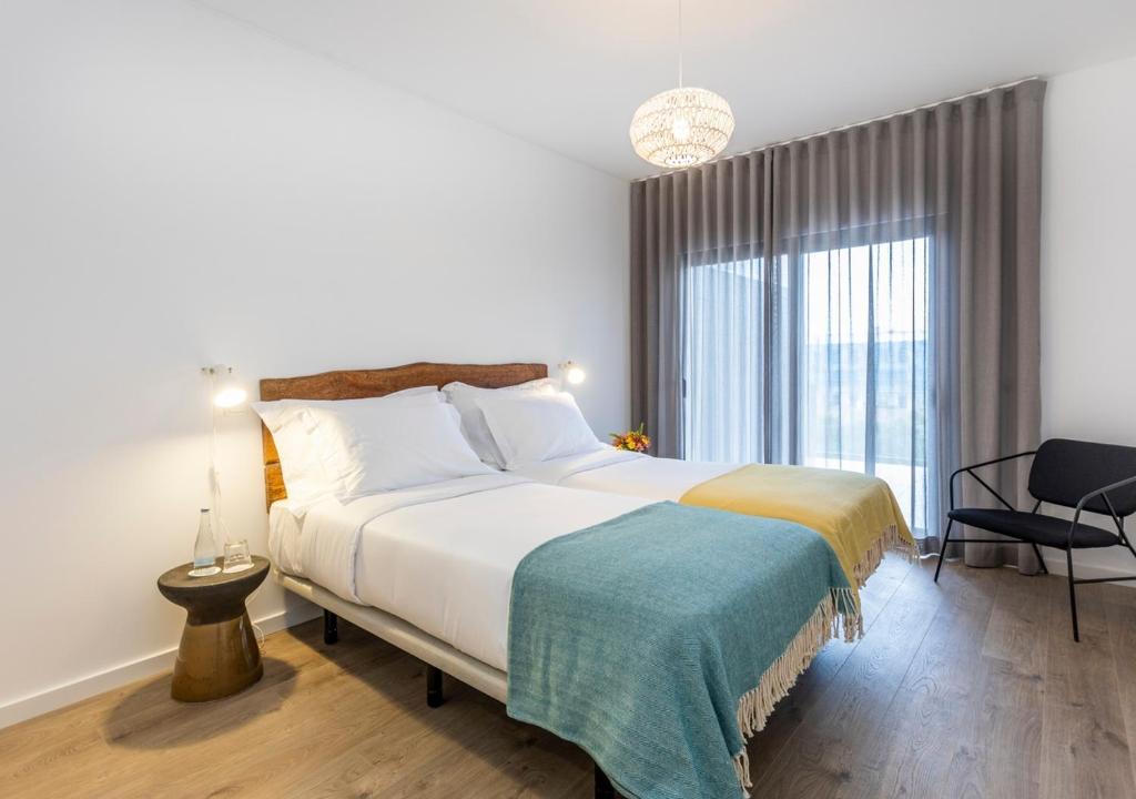 Een bed of bedden in een kamer bij You and the sea
