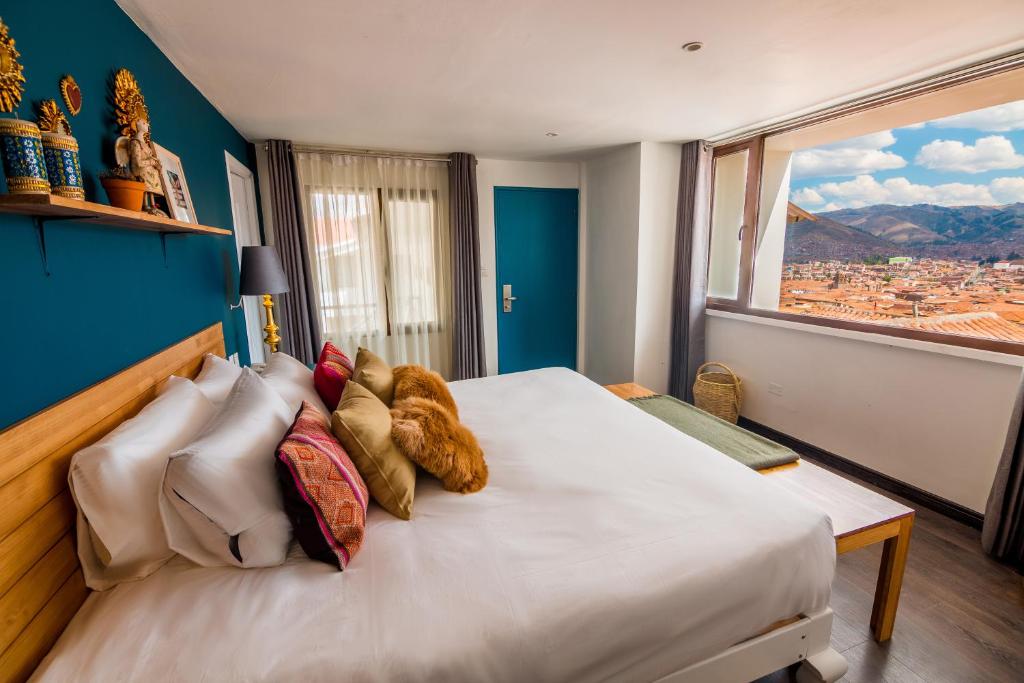 Letto o letti in una camera di Tariq Boutique