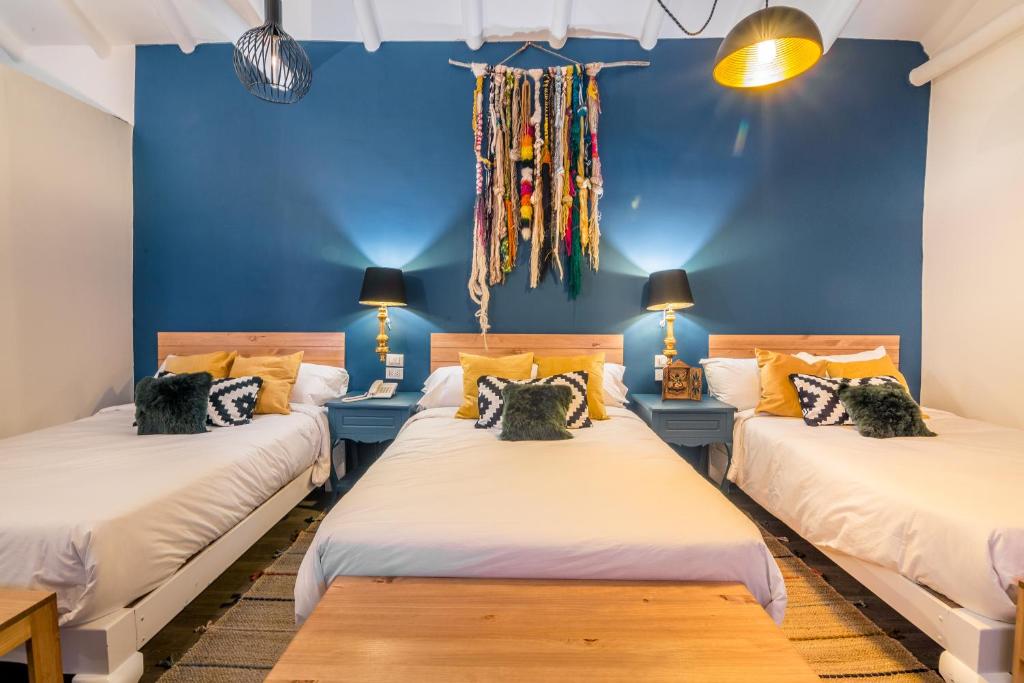 Letto o letti in una camera di Tariq Boutique
