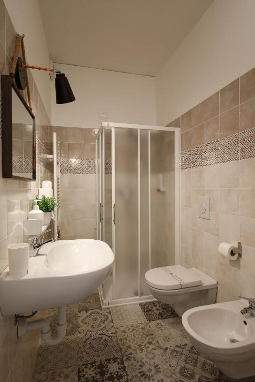 Koupelna v ubytování InGarda Rooms