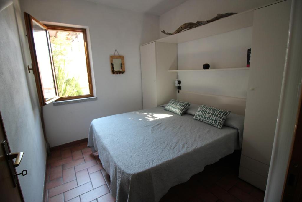 Postel nebo postele na pokoji v ubytování Un salto nel blu