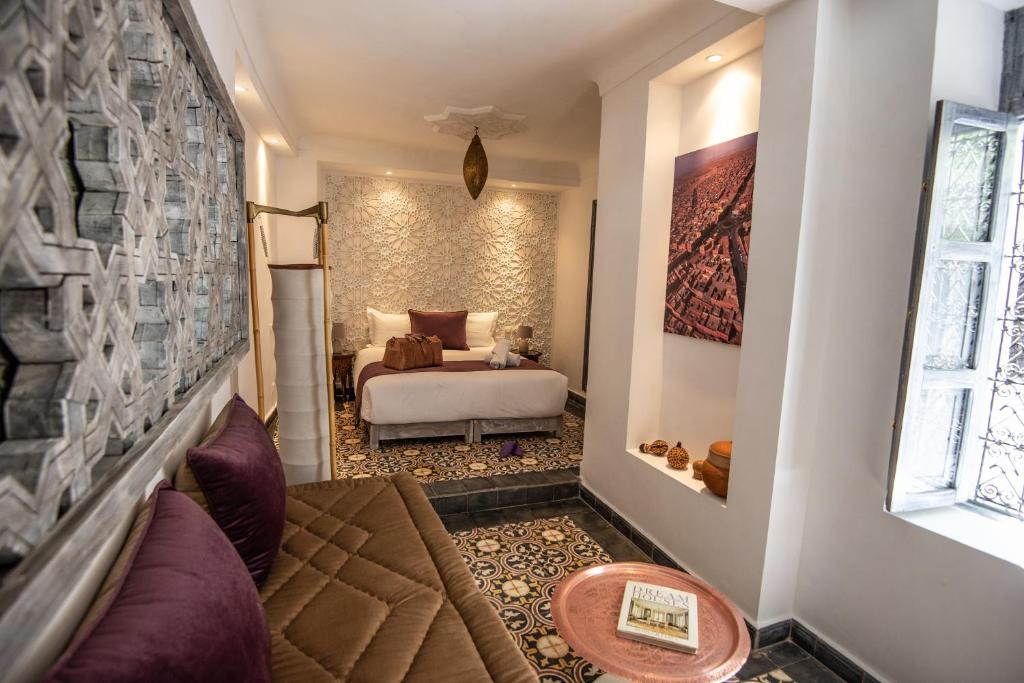 Postel nebo postele na pokoji v ubytování Riad Dar Tmania