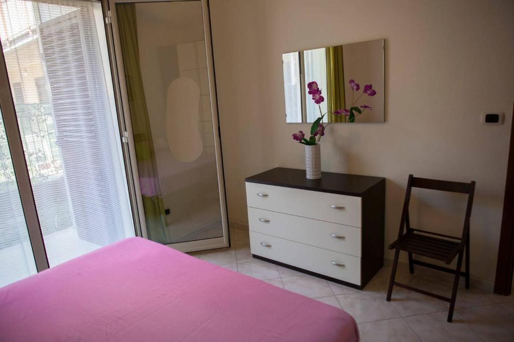 Postel nebo postele na pokoji v ubytování Casa Aurelia