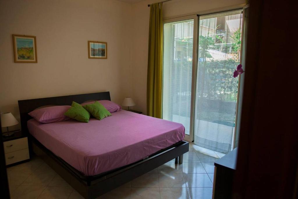 Postel nebo postele na pokoji v ubytování Casa Aurelia