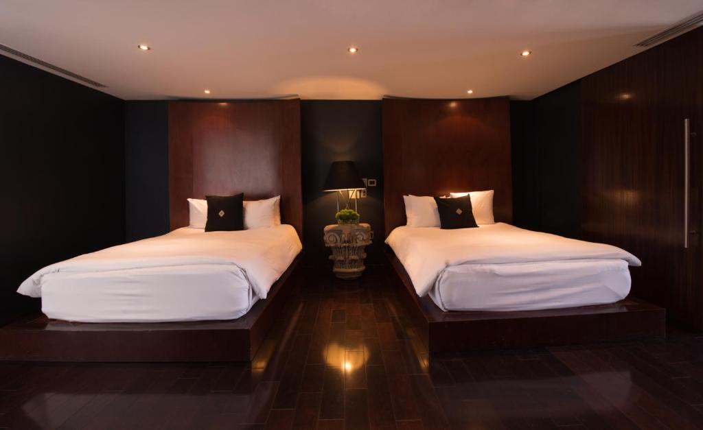 Postel nebo postele na pokoji v ubytování Demetria Hotel