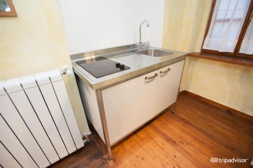 Kuchyňa alebo kuchynka v ubytovaní Aprile