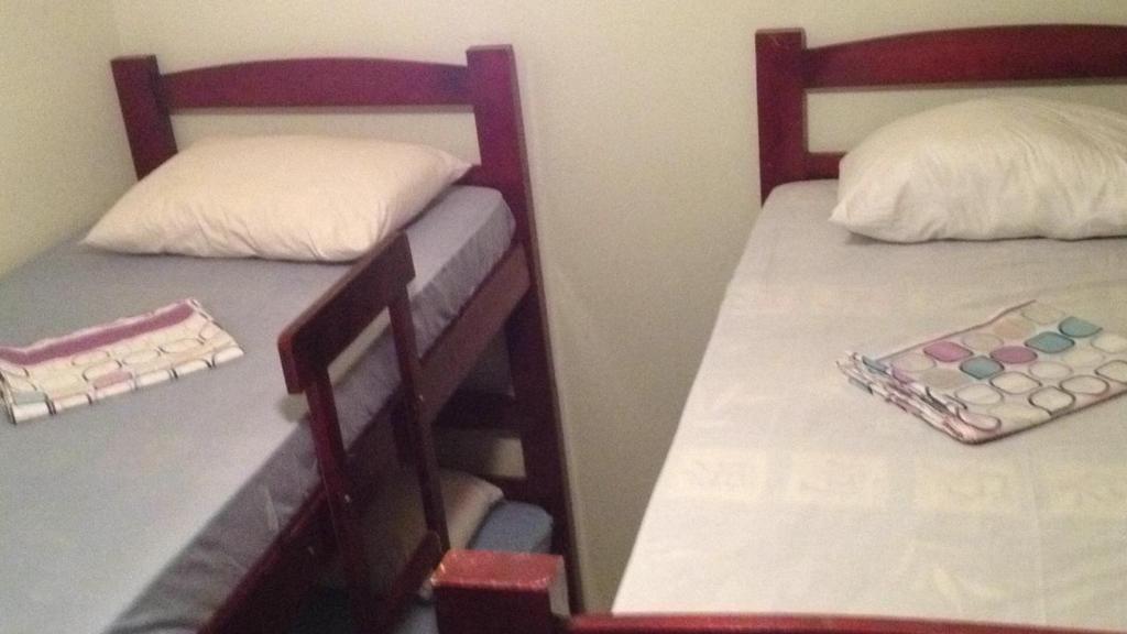 Suites Santa Amelia - Lit Dans Une Salle De Dortoir Masculin à 5 Lits