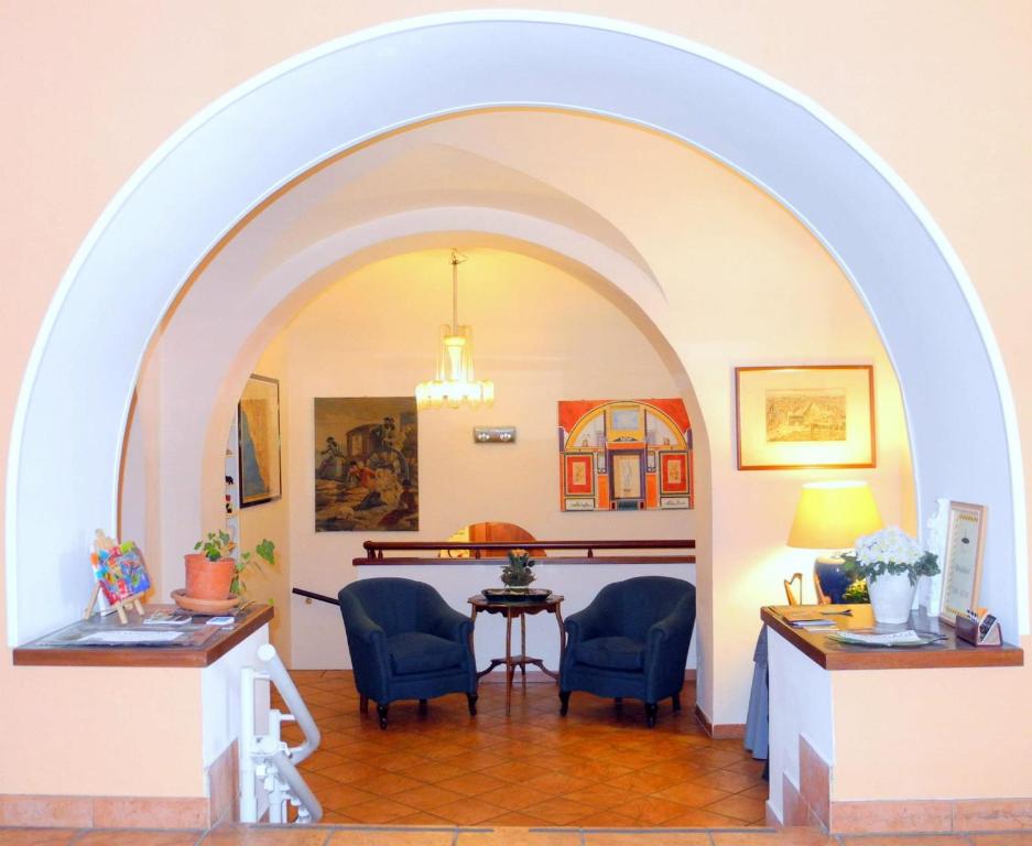 Posezení v ubytování Hotel Corona