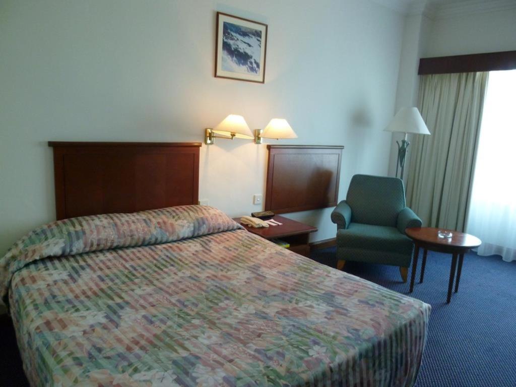 Postel nebo postele na pokoji v ubytování GOCOS Hotel