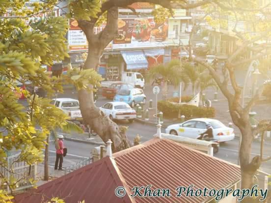 a view of a city street with cars at La Plaine Verte Guesthouse in Port Louis