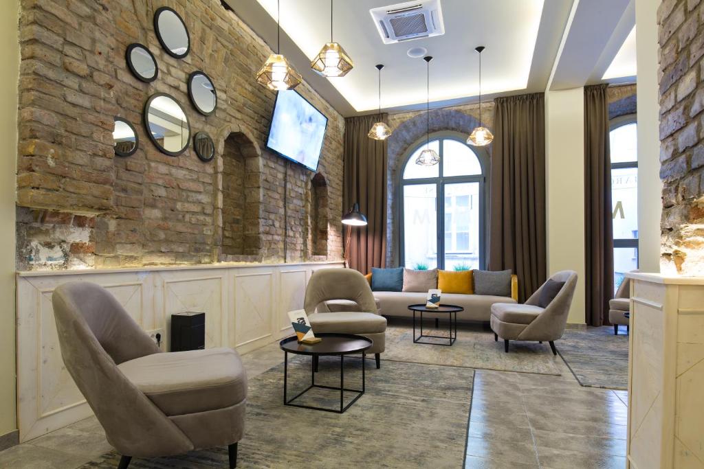 Posezení v ubytování Marquise Hotel Garni