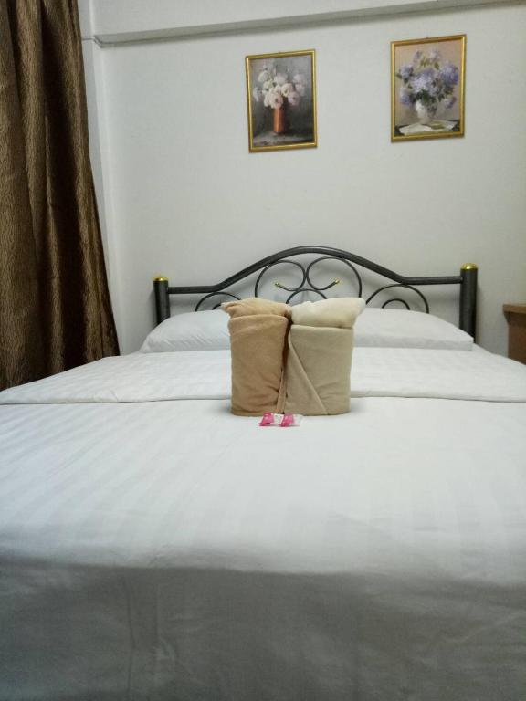 Voodi või voodid majutusasutuse TT Hostel Chiangrai toas