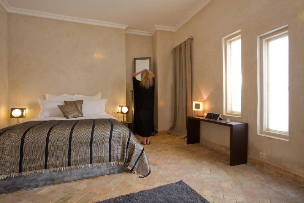 Postel nebo postele na pokoji v ubytování Riad Cocoon