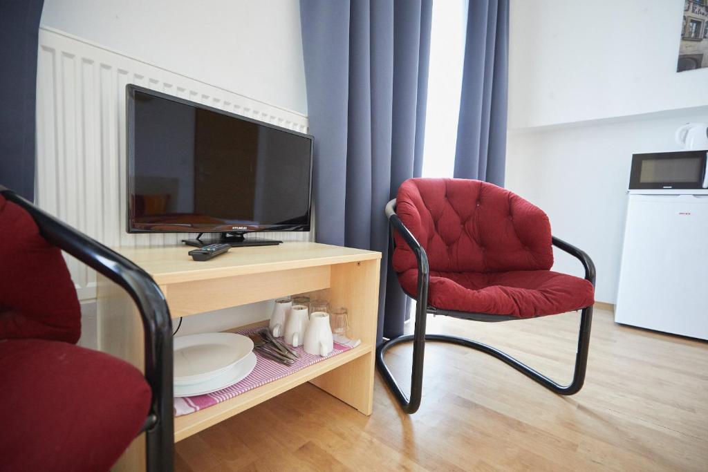 TV a/nebo společenská místnost v ubytování University Hotel