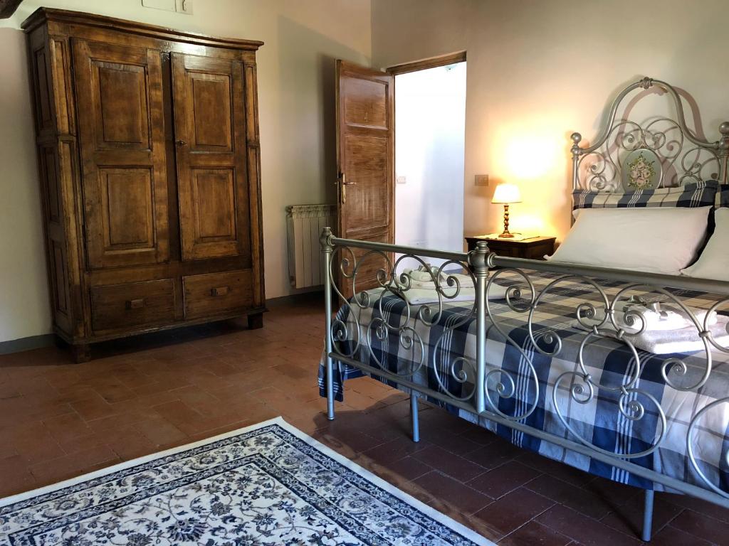 A bed or beds in a room at Relais Puccini