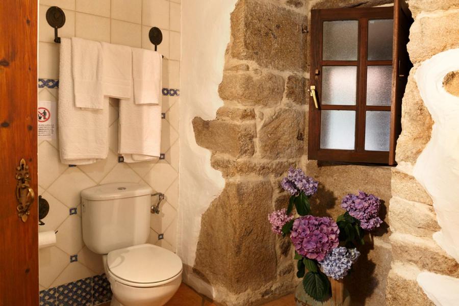 Ванная комната в Lugar dos Devas