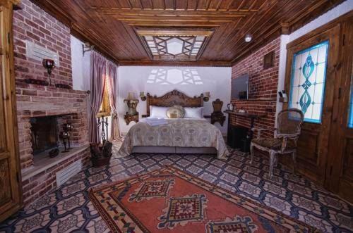 Postel nebo postele na pokoji v ubytování Ayşe Hanım Konağı