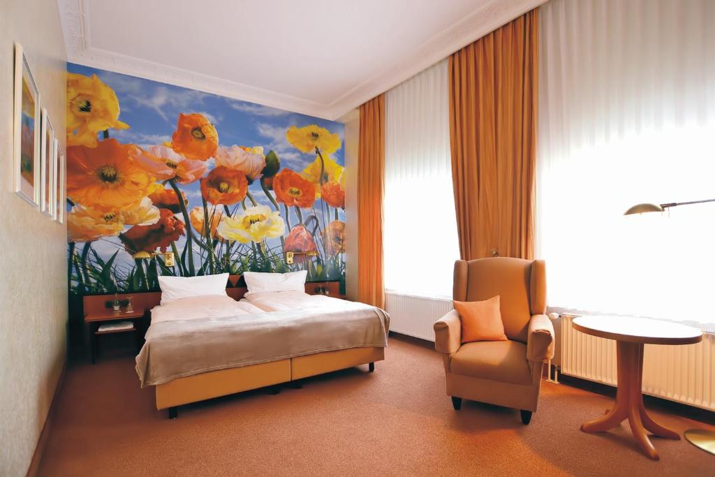 Postel nebo postele na pokoji v ubytování Hotel Jugendstil