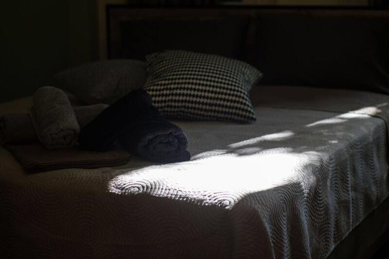 A bed or beds in a room at Thessaloniki Loxandra's House