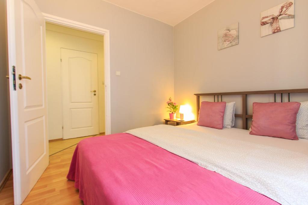 Posteľ alebo postele v izbe v ubytovaní Rental Apartments Warecka