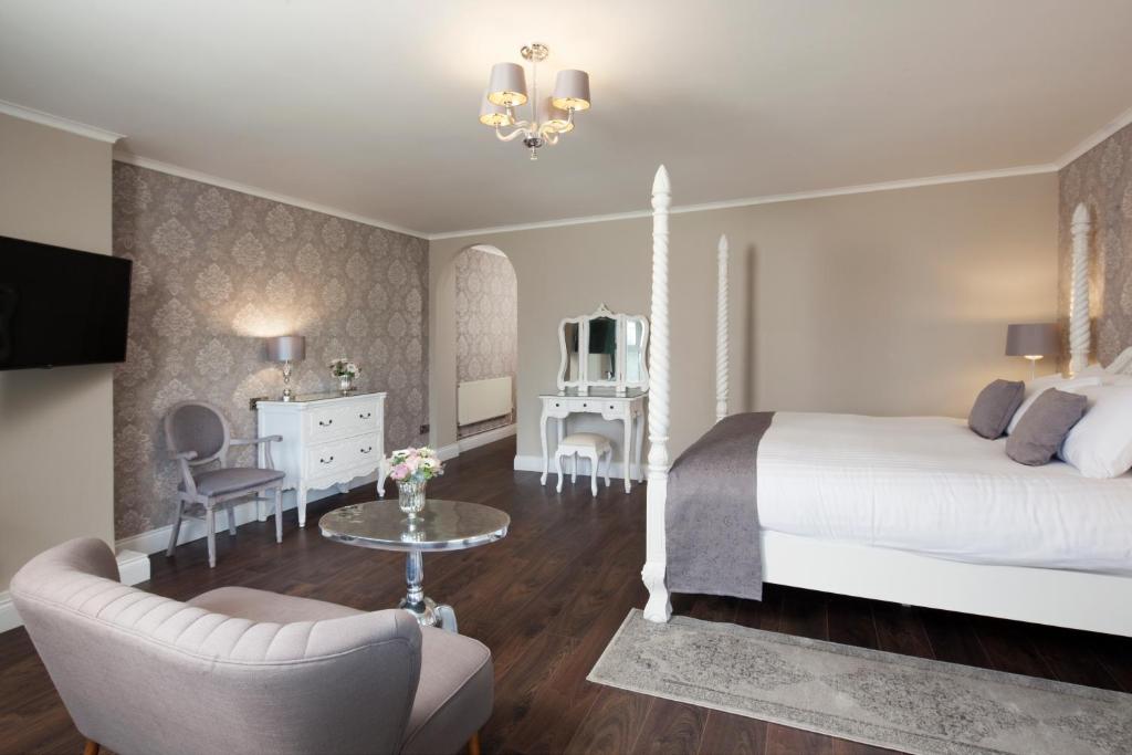 Postel nebo postele na pokoji v ubytování Elfordleigh Hotel