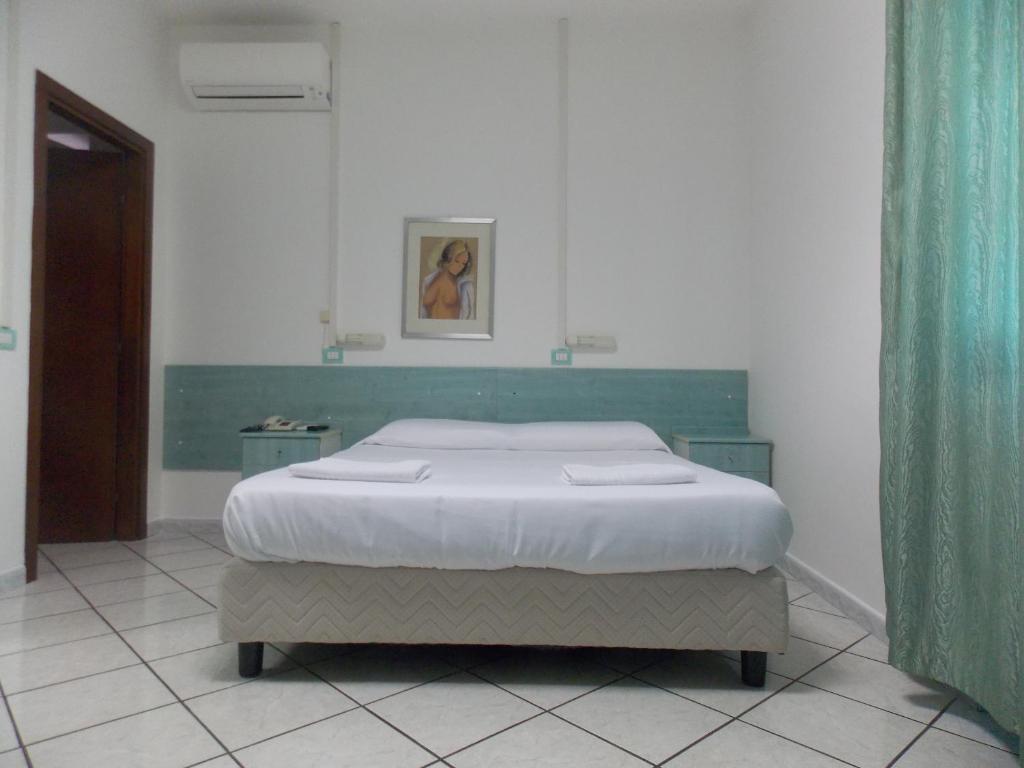 Postel nebo postele na pokoji v ubytování Hotel Villa dei Butteri - Aprilia