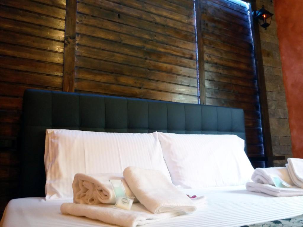 Postel nebo postele na pokoji v ubytování Cà Elsa B&B