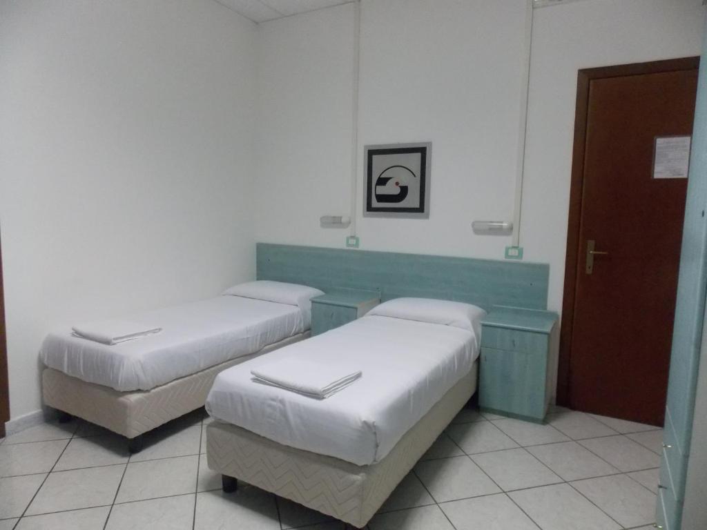 Postel nebo postele na pokoji v ubytování Hotel Villa dei Butteri - Aprilia